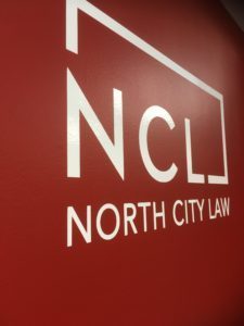 NCL logo in the office